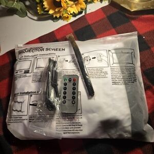 Source Unknown Outdoor Projector Screen with Remote